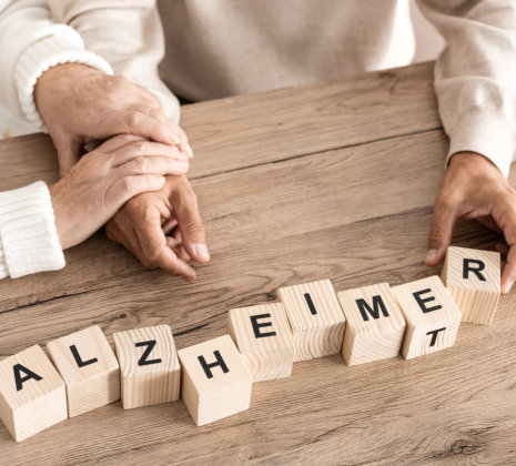 a wooden box shaped alphabet spelled alzheimer